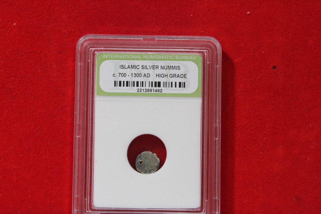 A Slabbed Islamic Silver Nummis: High Grade - c. 700 - 1300 A.D.