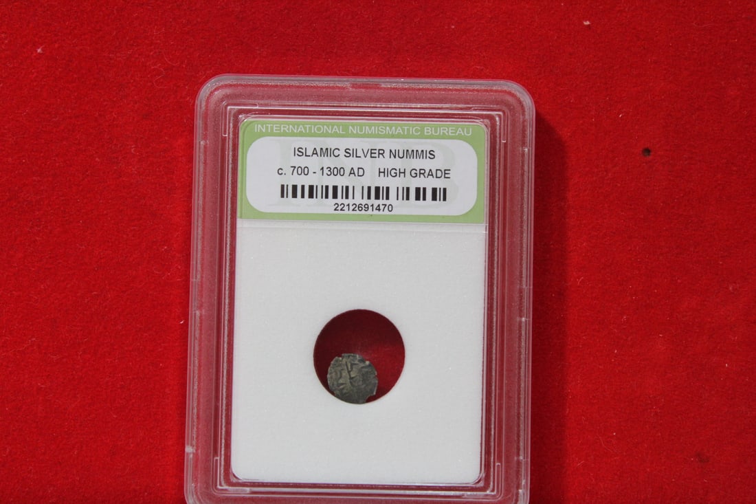 A Slabbed Islamic Silver Nummis: High Grade - c. 700 - 1300 A.D.