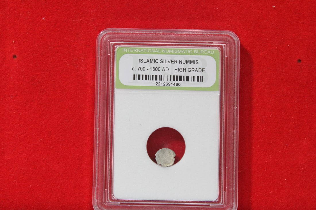 A Slabbed Islamic Silver Nummis: High Grade - c. 700 - 1300 A.D.