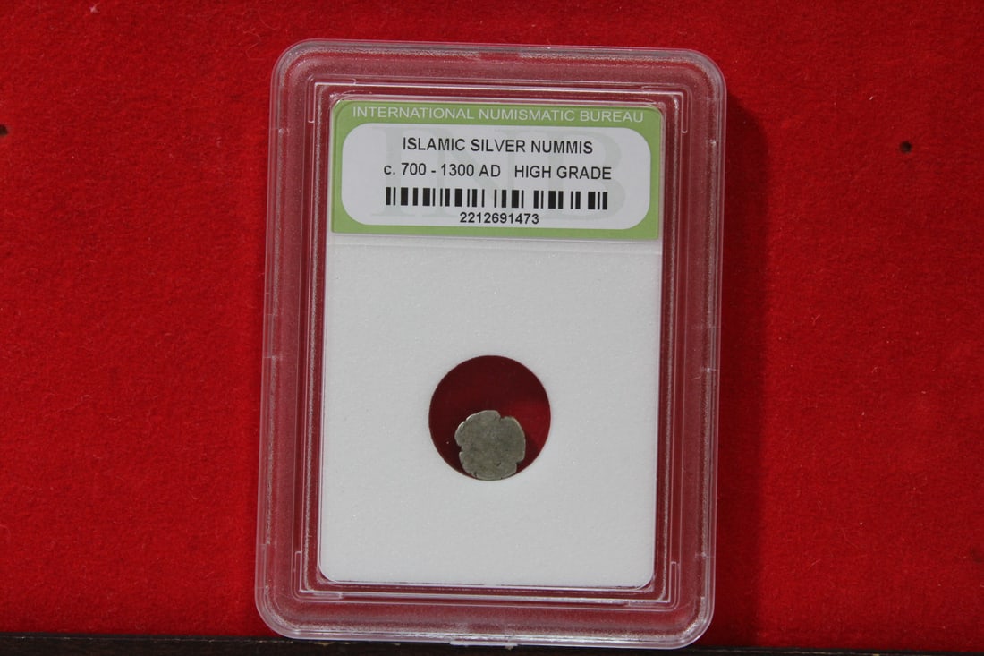 A Slabbed Islamic Silver Nummis: High Grade - c. 700 - 1300 A.D.