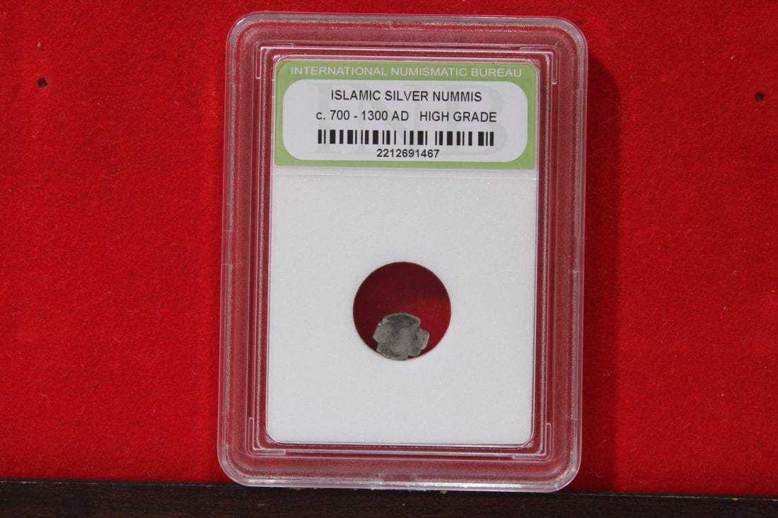 A Slabbed Islamic Silver Nummis: High Grade - c. 700 - 1300 A.D.