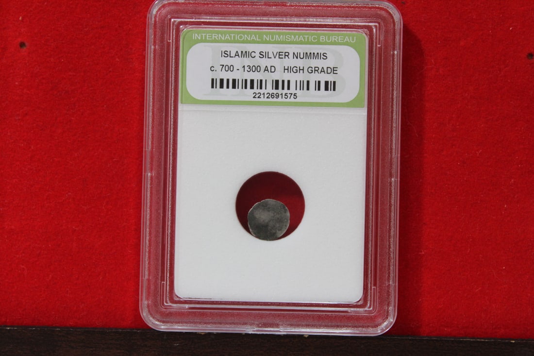 A Slabbed Islamic Silver Nummis: High Grade - c. 700 - 1300 A.D.