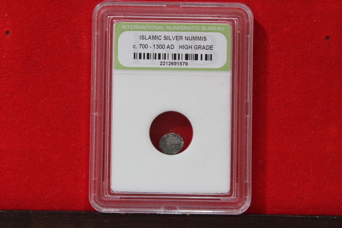 A Slabbed Islamic Silver Nummis: High Grade - c. 700 - 1300 A.D.