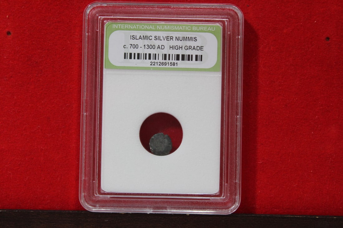A Slabbed Islamic Silver Nummis: High Grade - c. 700 - 1300 A.D.