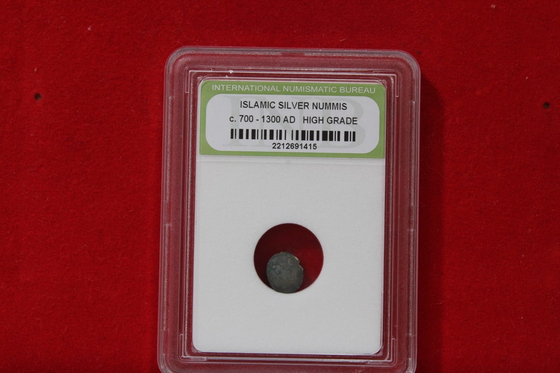 A Slabbed Islamic Silver Nummis: High Grade - c. 700 - 1300 A.D.