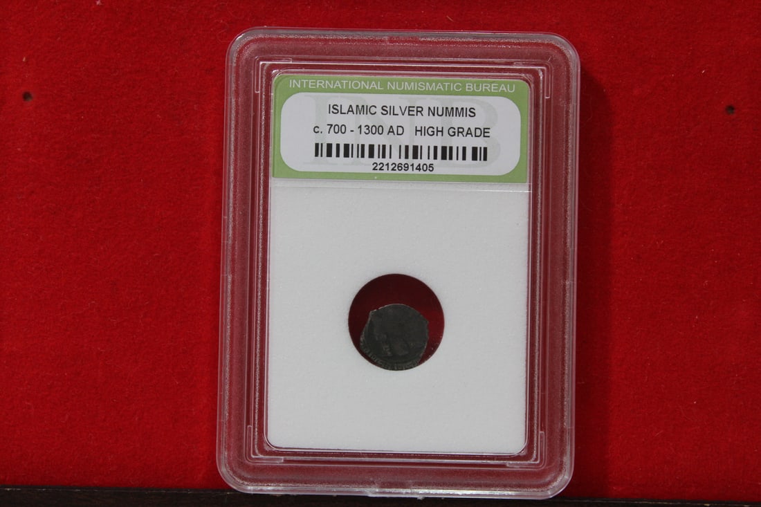A Slabbed Islamic Silver Nummis: High Grade - c. 700 - 1300 A.D.