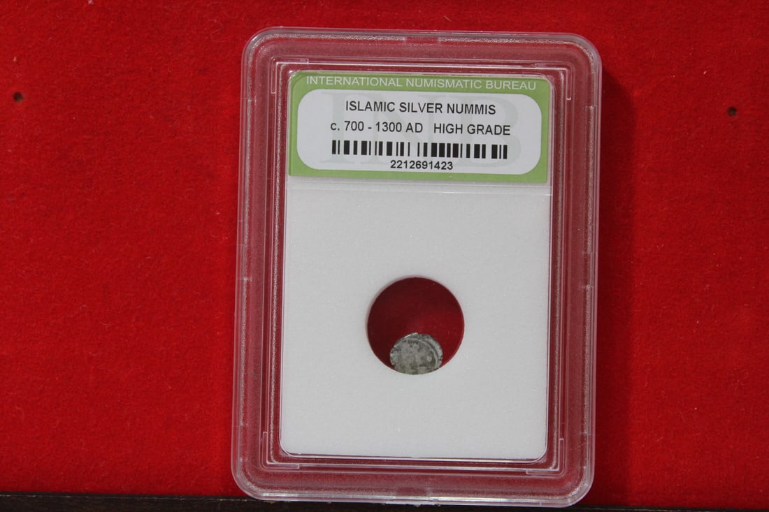 A Slabbed Islamic Silver Nummis: High Grade - c. 700 - 1300 A.D.