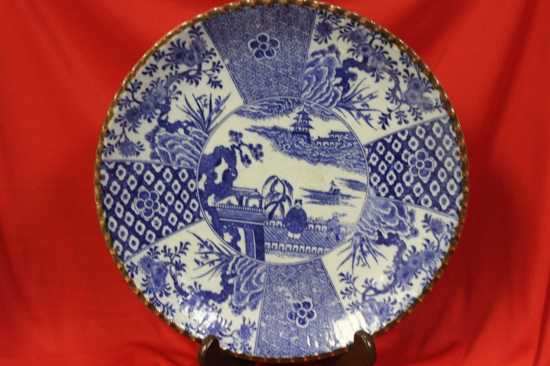 A Japanese Blue and White Porcelain Imari Plate: 12" in diameter