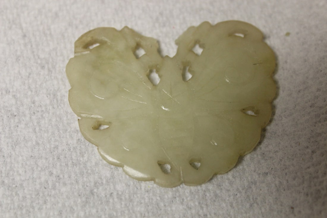 Antique Chinese Carved Jade Butterfly: Appears to be white jade. 19th / 20th century. Carved on both sides. Please note, missing a bridge on top of butterfly. 2 1/8" in diameter.