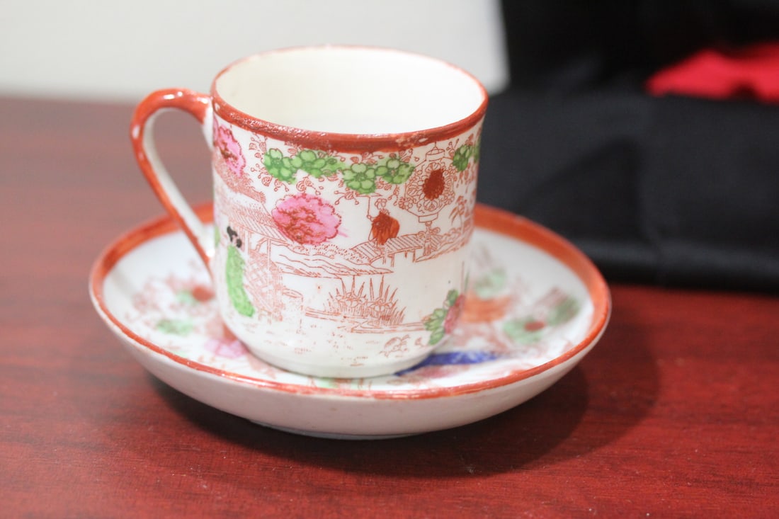 A Japanese Geisha Girl Cup and Saucer: saucer= 4 3/8" in diameter