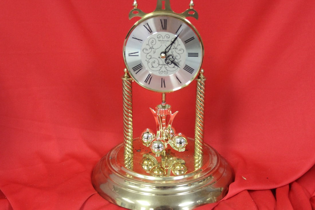 A Quartz Dome Clock: movement is currently working, but no guarantee that it will whaen it arrives - 11 1/2" tall