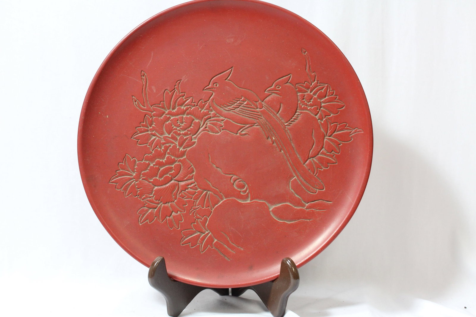 A Chinese Cinnabar Lacquer Plate: 11 3/4" in diameter