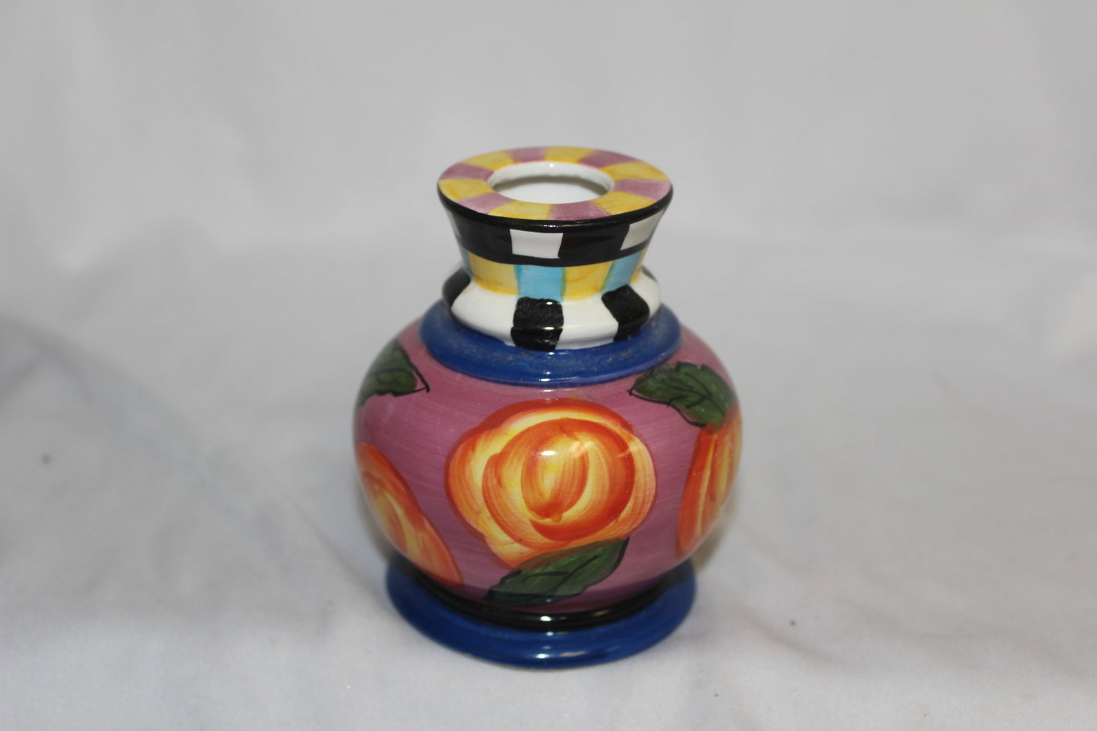 A Ceramic Candle Stick: 3 3/8" tall