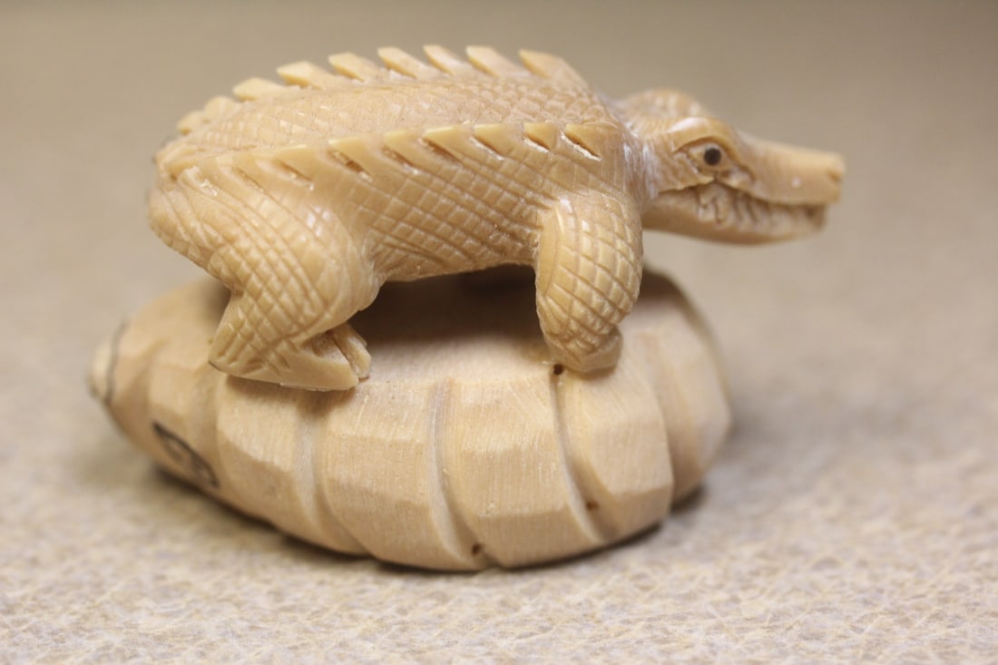 Taqua or Palm Nut Carving of an Alligator: on rock - 2 1/2" wide