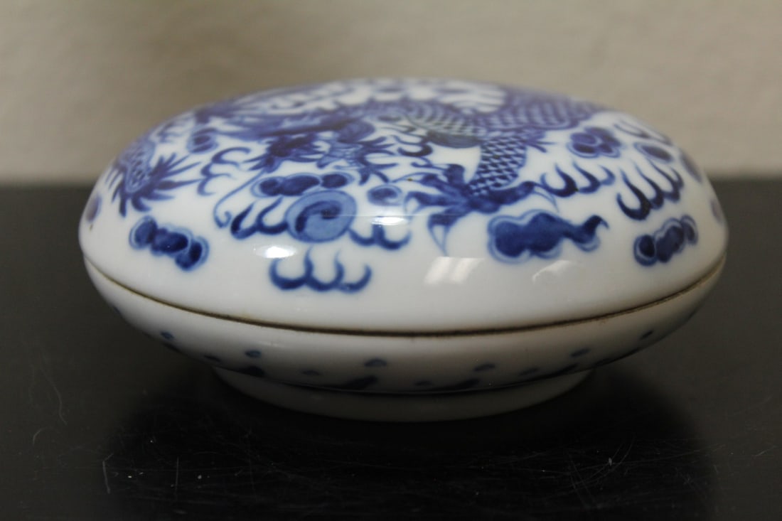 A Chinese Blue and White Porcelain Dragon Box: most likely 19th century - please note: chip - 4 1/4" in diameter