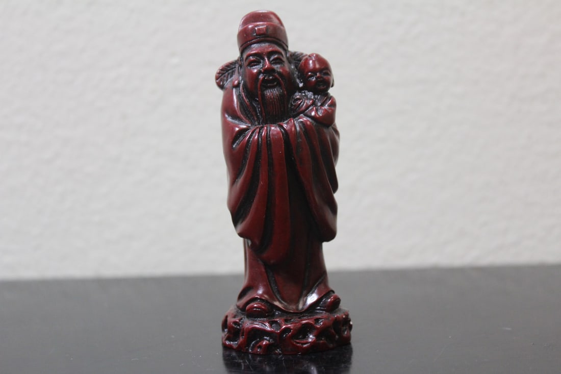 A Chinese Resin Sage: 4" tall