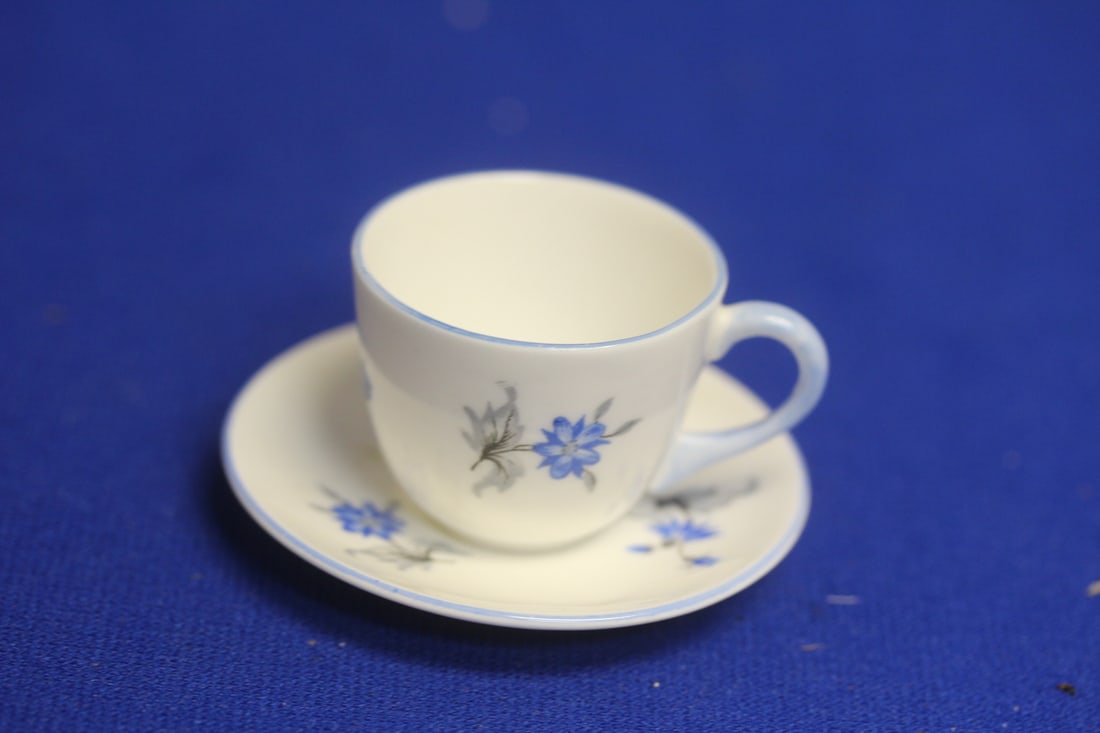 A Miniature Shelley Cup and Saucer: cup= 1 1/4" tall