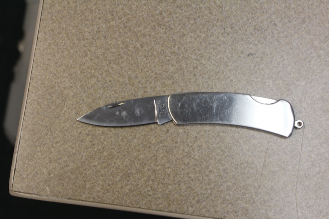 Steinless Steel Pocket Knife: makers unknown - 3 1/2" long when folded