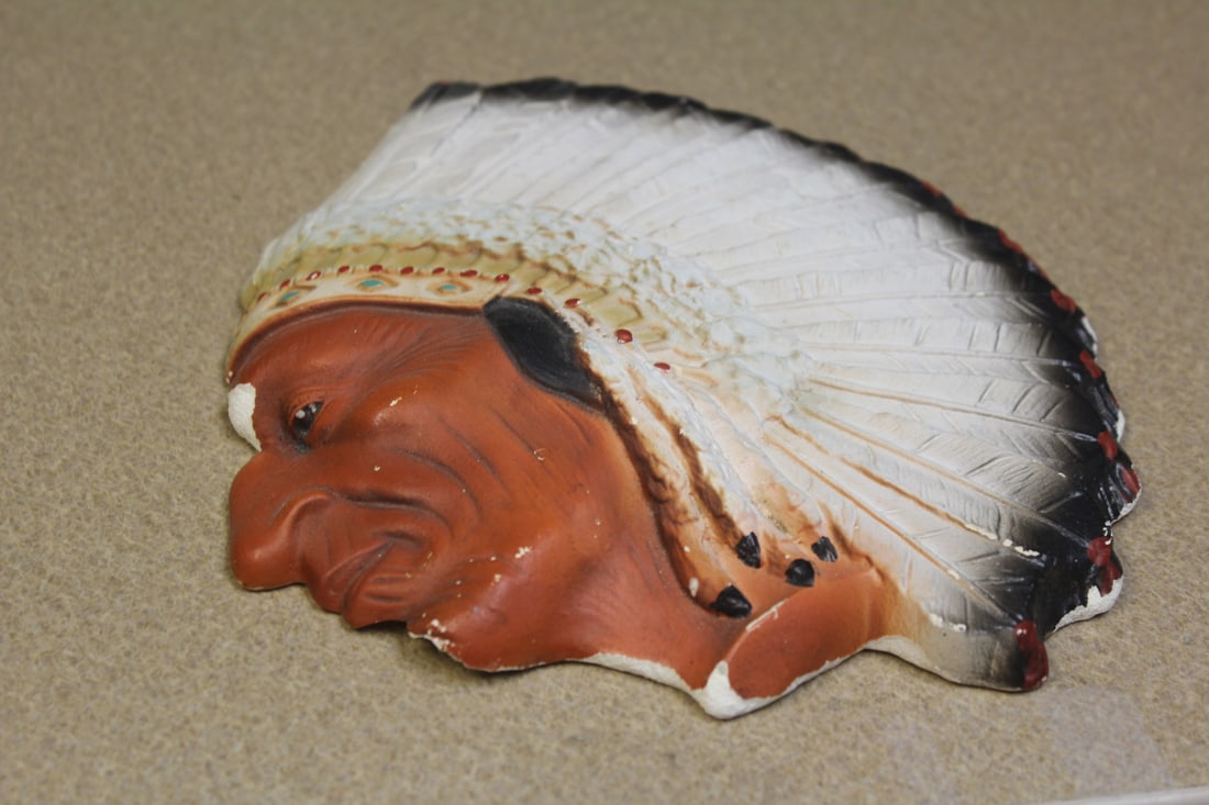 Chalk Indian Head: please note: chips and worn - wall hanger - 9 1/2" in diameter