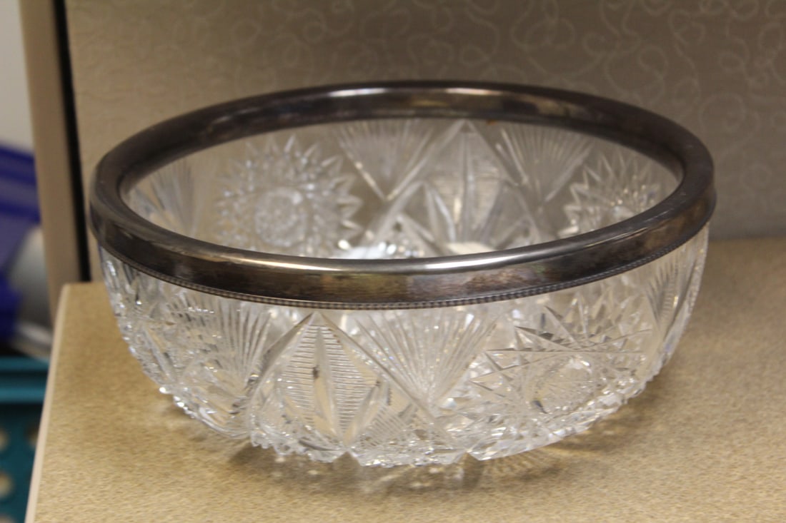 Large Cut Glass Bowl: marked "sterling" rim - 8 7/8" in diameter