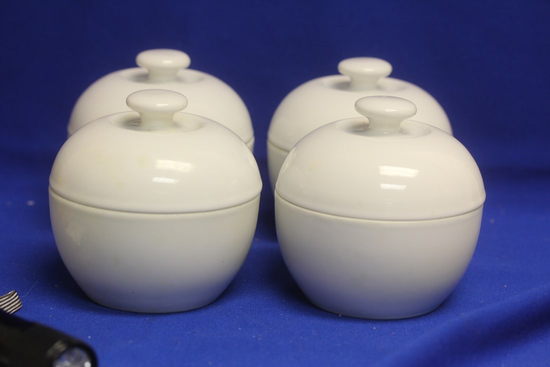 Set of 4 Royale Rego Jar: with lids - please note: one has an inner rim chip, not noticeable when lid is on - 4 1/2" tall