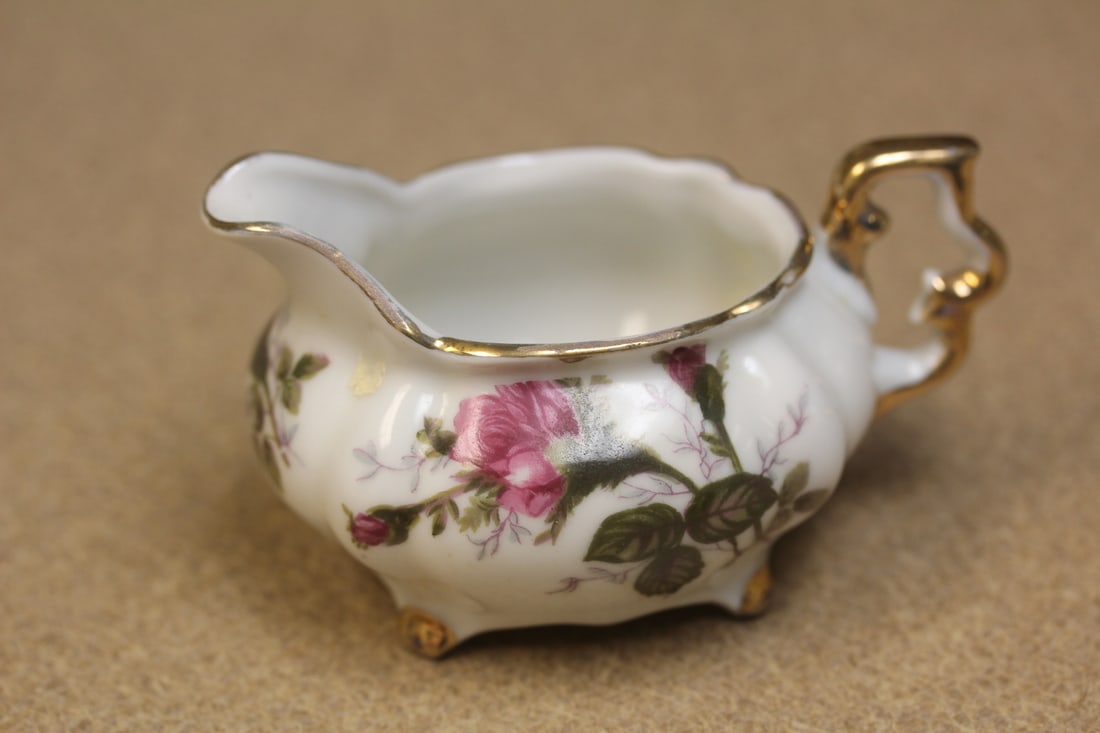 Small Floral Creamer: 4" across