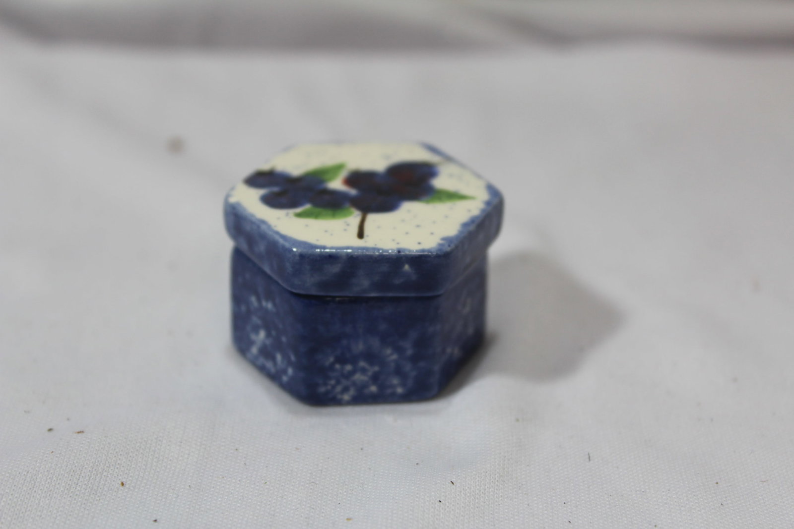A Signed Septagon Ceramic Trinket Box: 1 3/4" in diameter