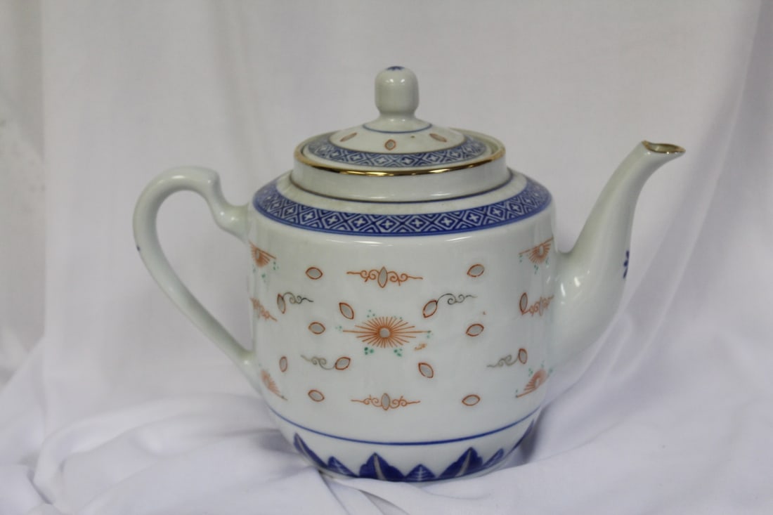 A Rice Pattern Chinese Teapot: 8 1/4" across