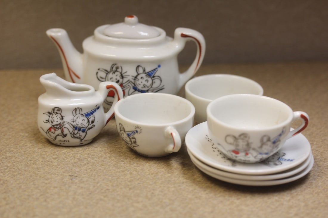 Lot of 8 Miniature Tea Set: made in Japan - to include 3 cups, 3 saucers, creamer and a teapot - teapot=4" wide
