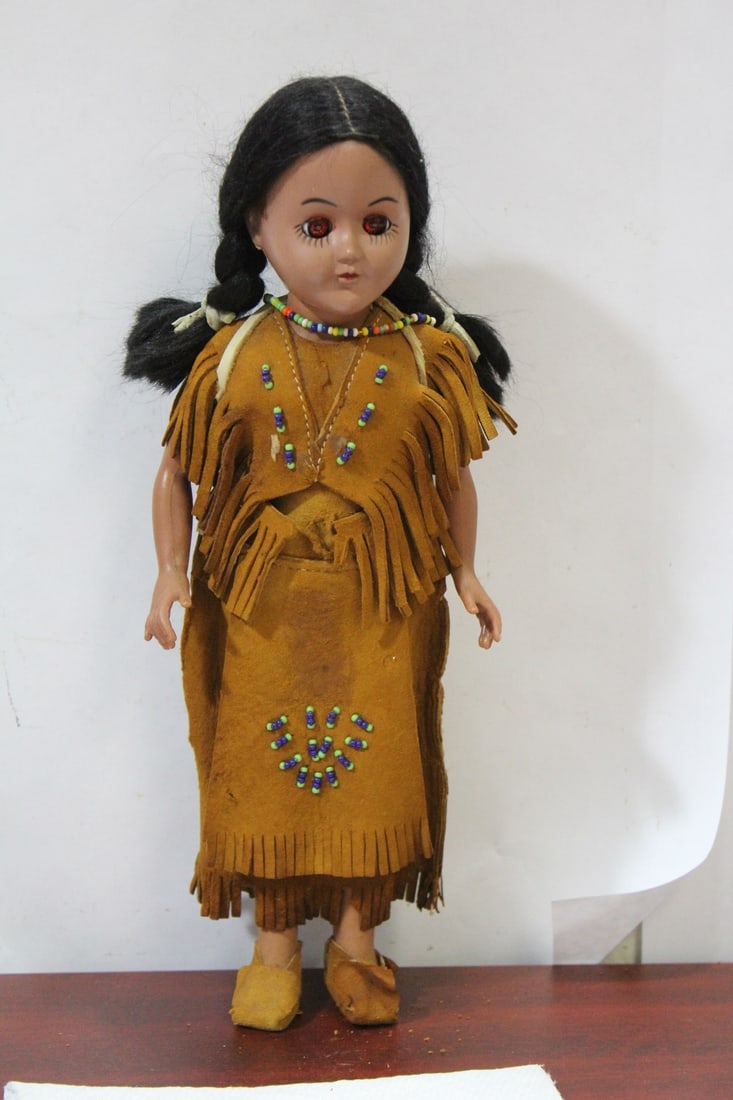 An Indian Doll: please note: clothes are torn - 11" tall