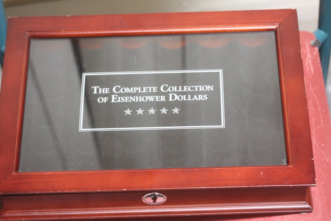 The Complete Collection of IKE Dollars: coin box - wood construction - 15 inches across - please note: no key