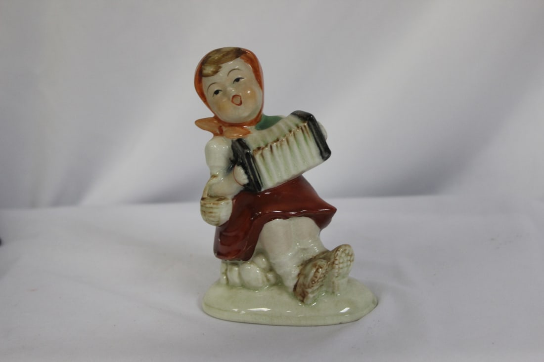 An Occupied Japan Figurine: 4 7/8" tall