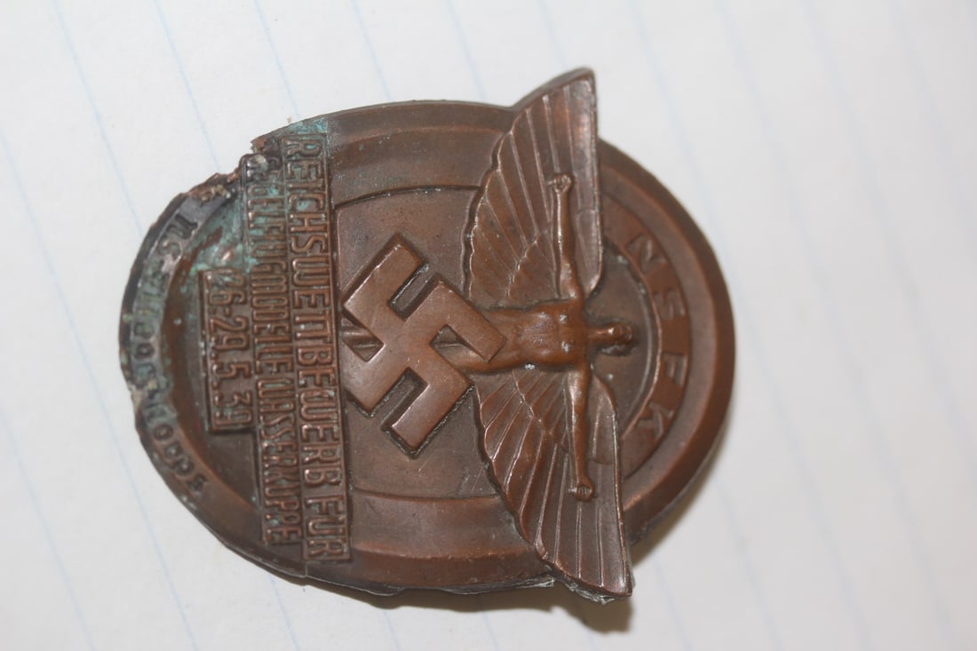 WWII Era German Pin: appeared to have the officer's name on the back, but not 100% sure