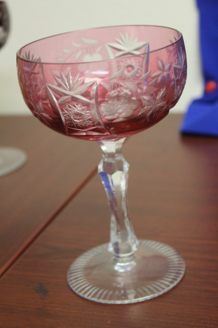 A Cranberry Cut Glass Wine Goblet: 6 1/4" tall