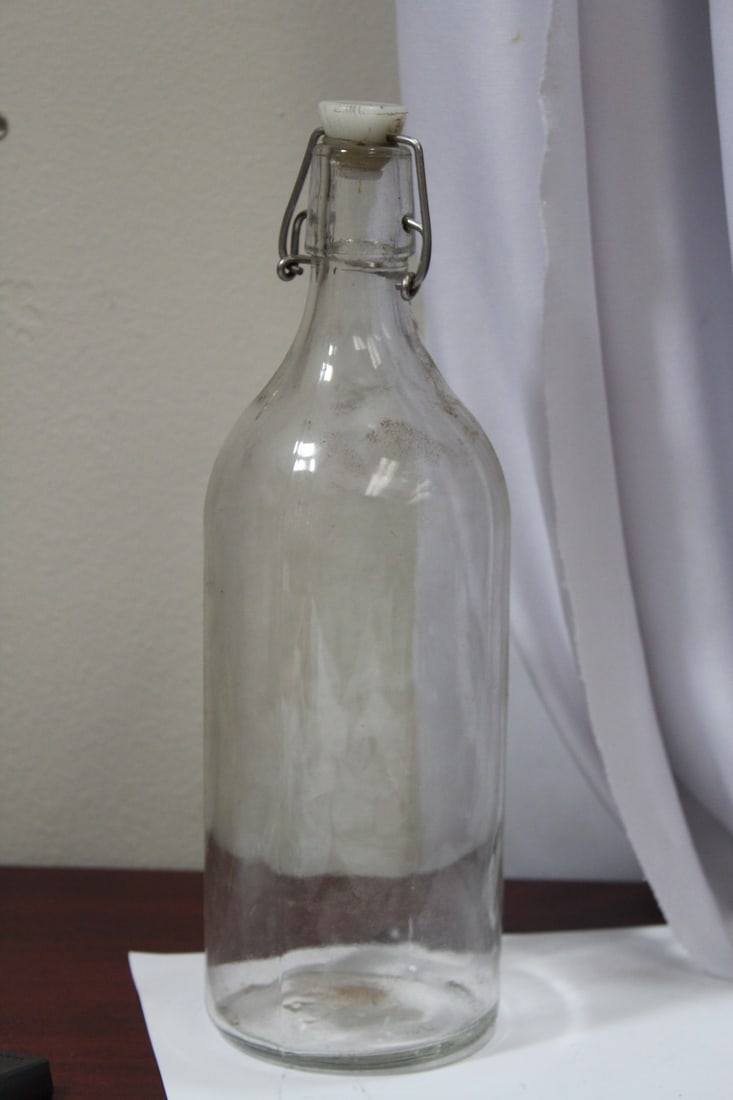 A Liquor Bottle: 11 1/4" tall