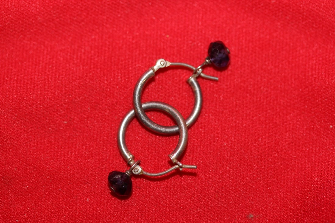 A Pair of Sterling Earrings: as seen on photos