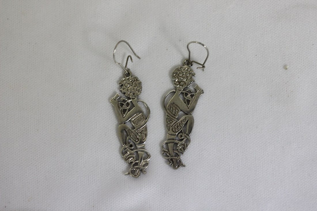 A Pair of Sterling Earrings: unusual design