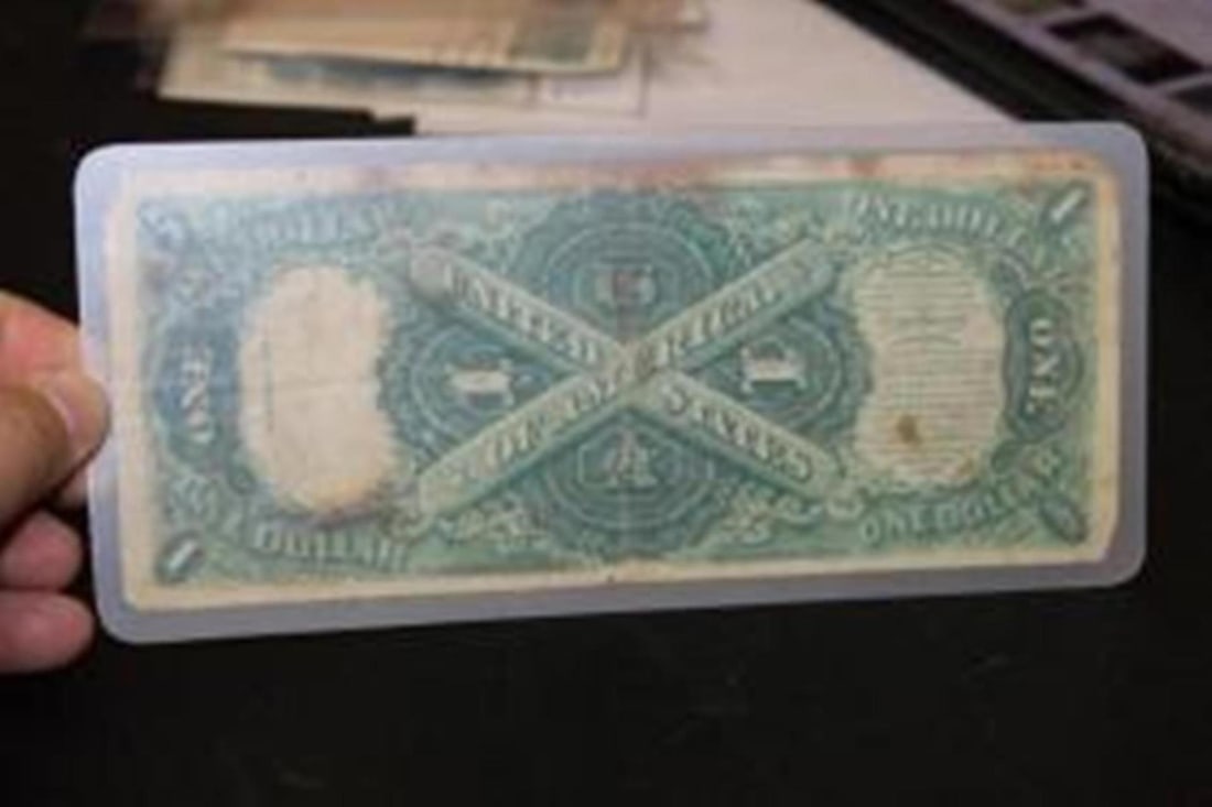 A Laminated 1917 $1.00 Note - 2