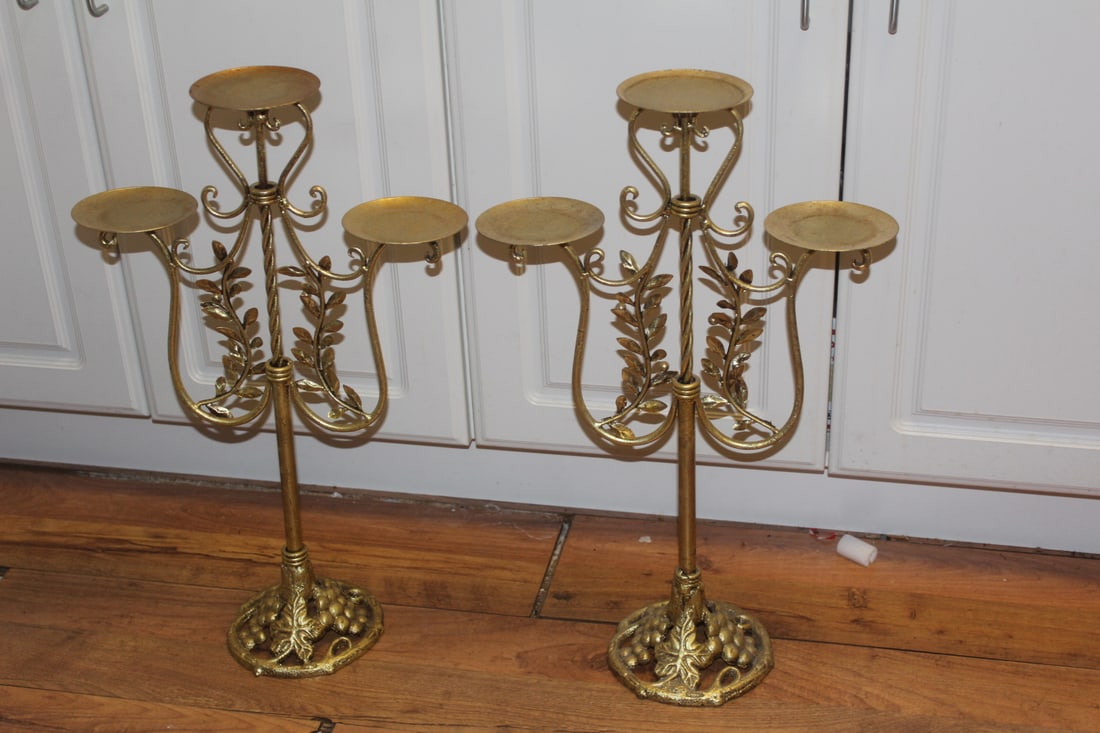 Pair of Gold Gilted Candle Holder: each measures 23 inches tall by 13 inches wide - metal=iron