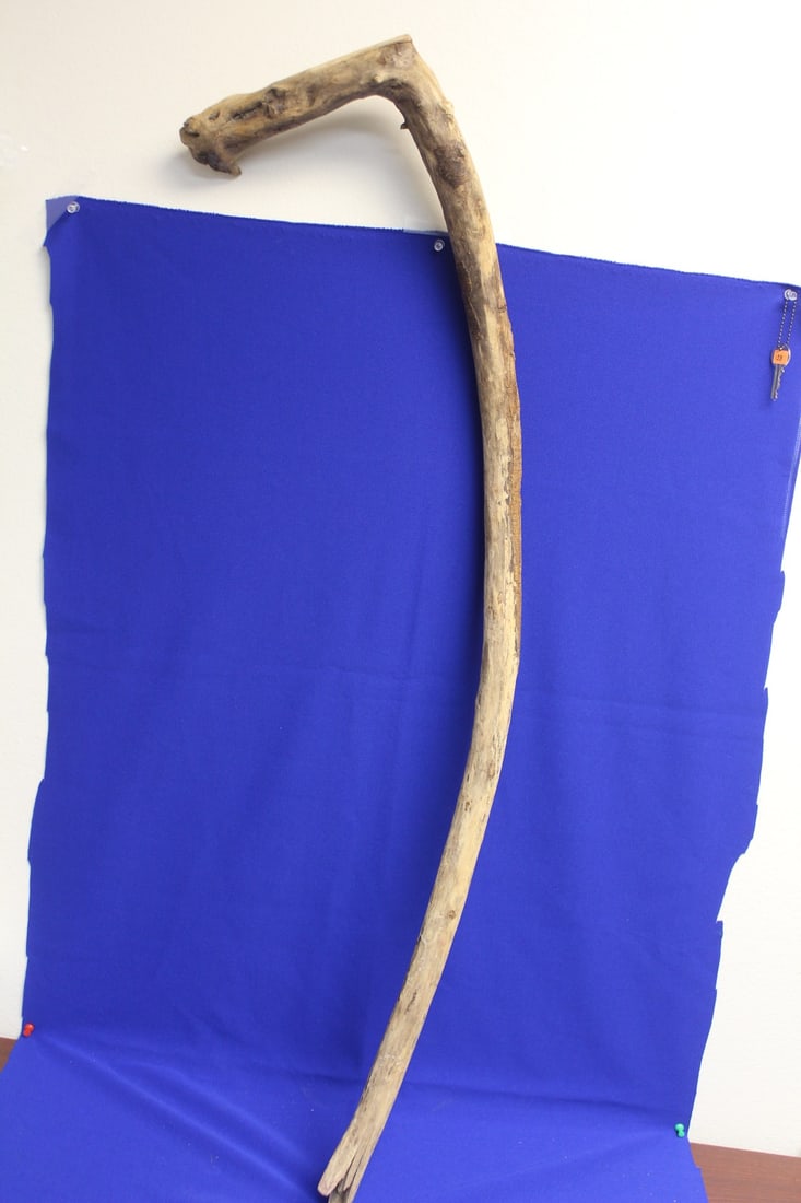 A Natural Wooden Cane: approximately 42 1/2" long