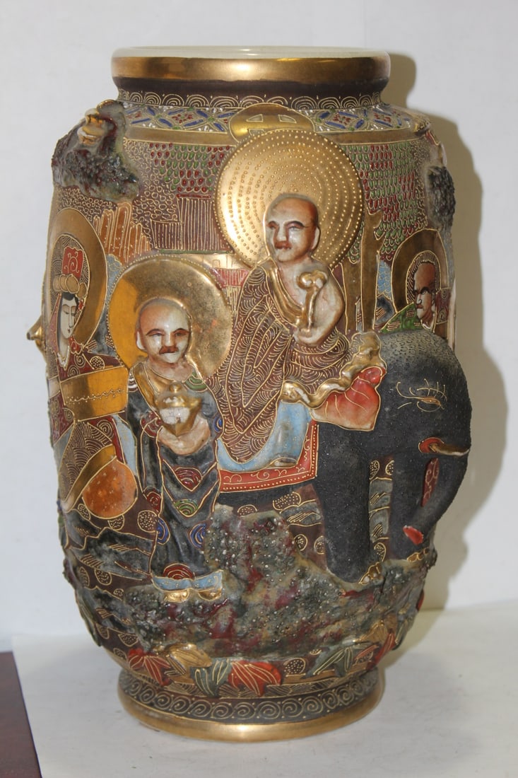 An Antique Japanese Large Satsuma Vase: 3 dimentional - please note: previously drilled as a lamp - 12 inches tall