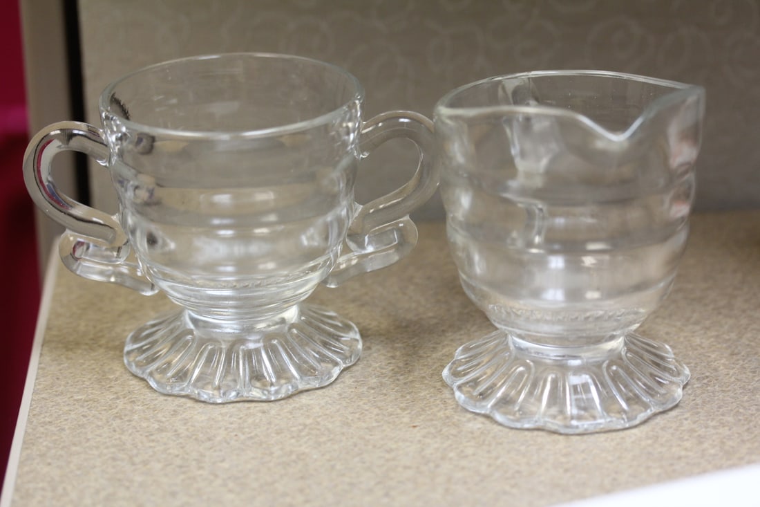 Glass cream and sugar container: tallest = 4"