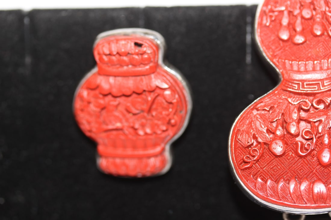 A Cinnabar and Sterling Suite - 2