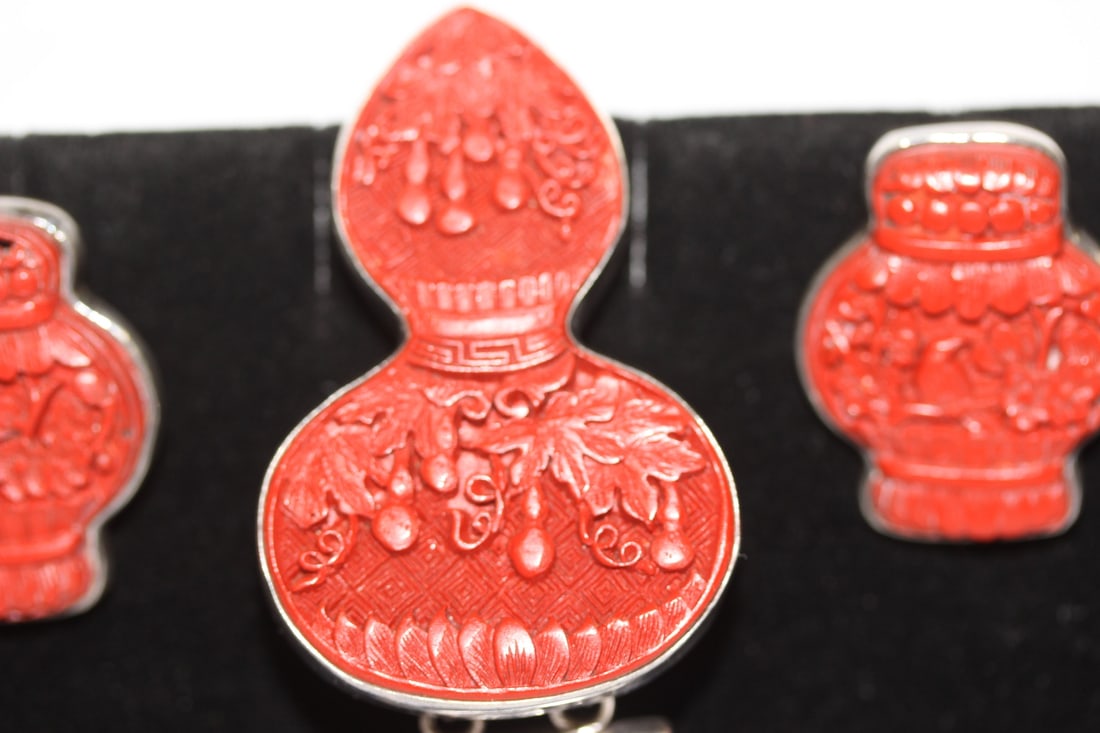 A Cinnabar and Sterling Suite - 3