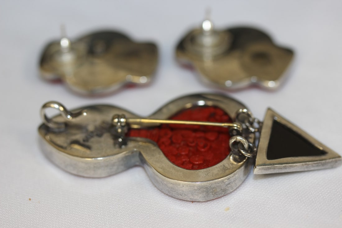 A Cinnabar and Sterling Suite - 6