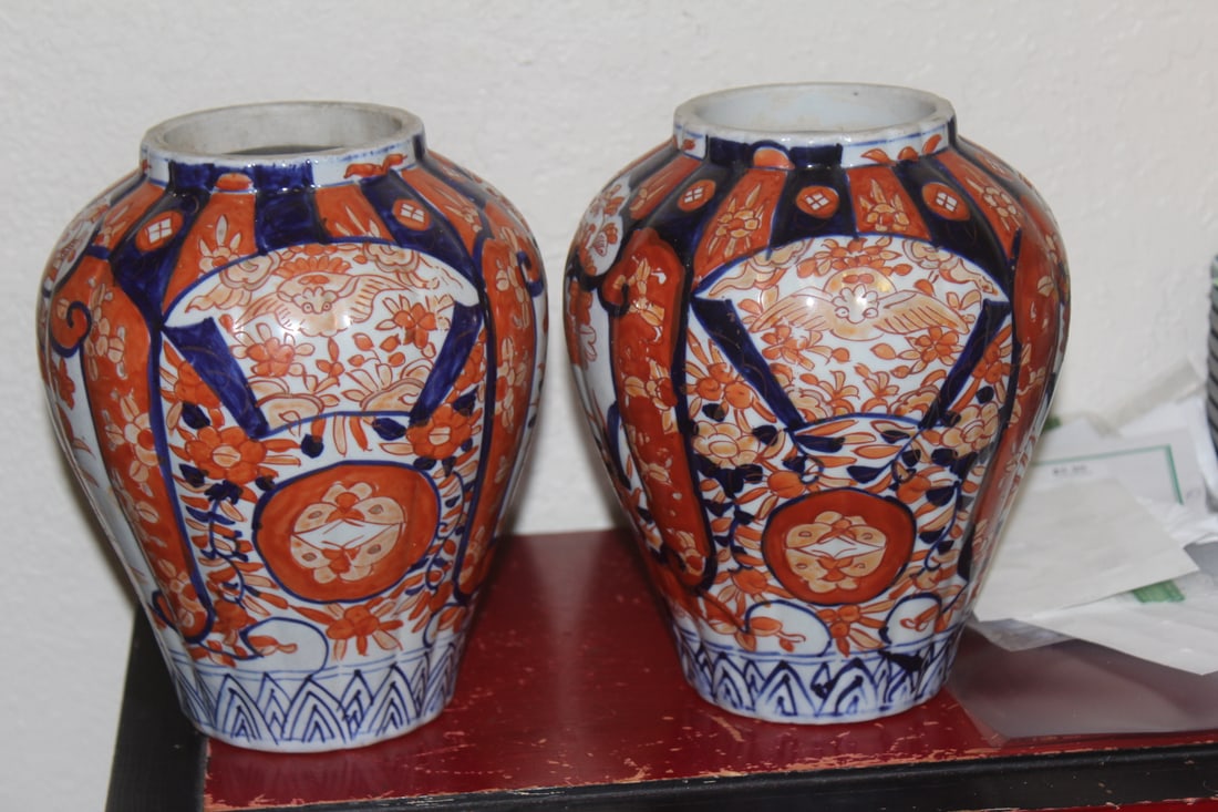 Pair of Japanese Imari Vases: 19th century - 7 1/2" tall - design of each slightly different as shown