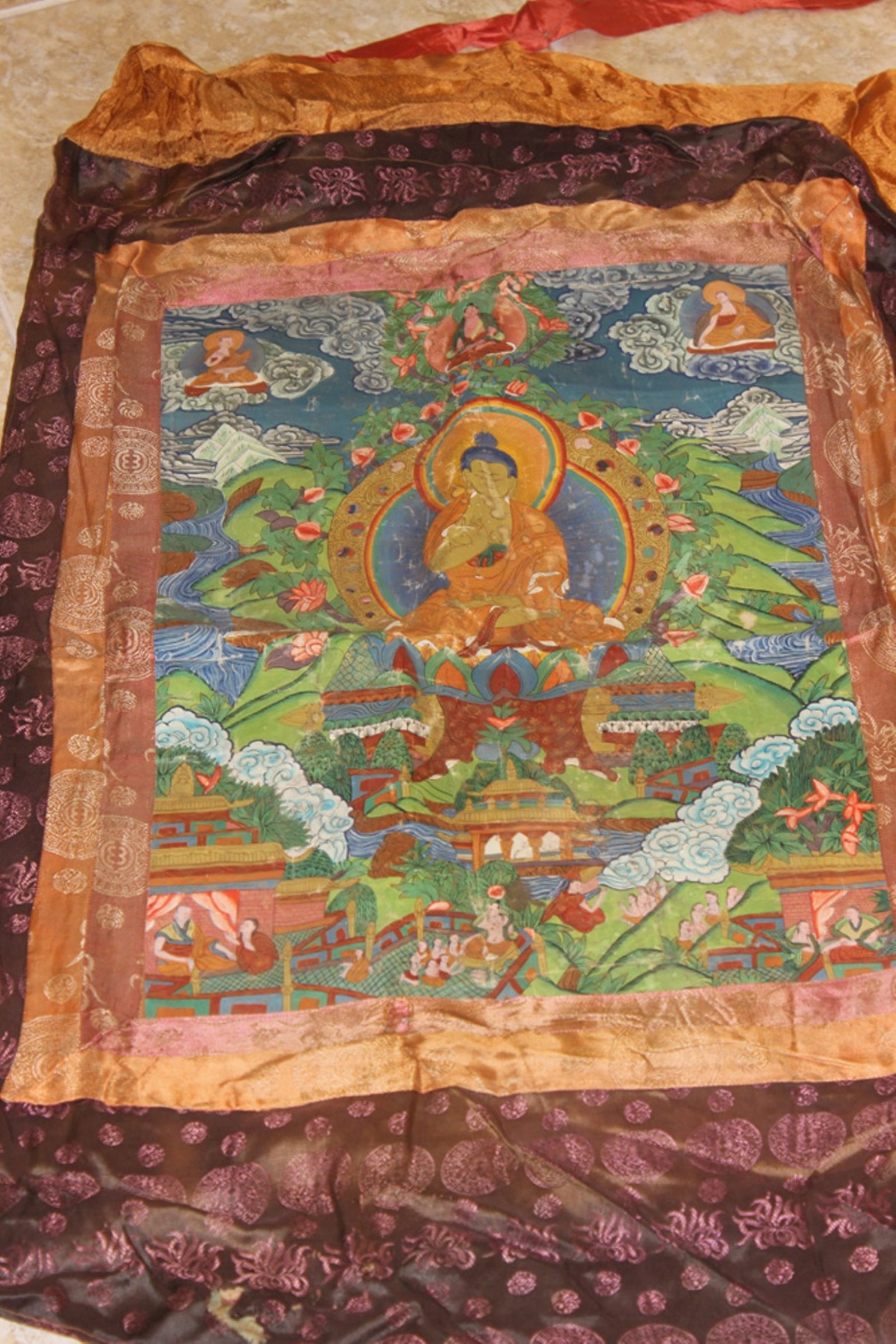 Antique / Vintage Tibetan Thangka: Circa early 20th century. Unframed. Measures 34 1/2" x 23 1/2" overall.