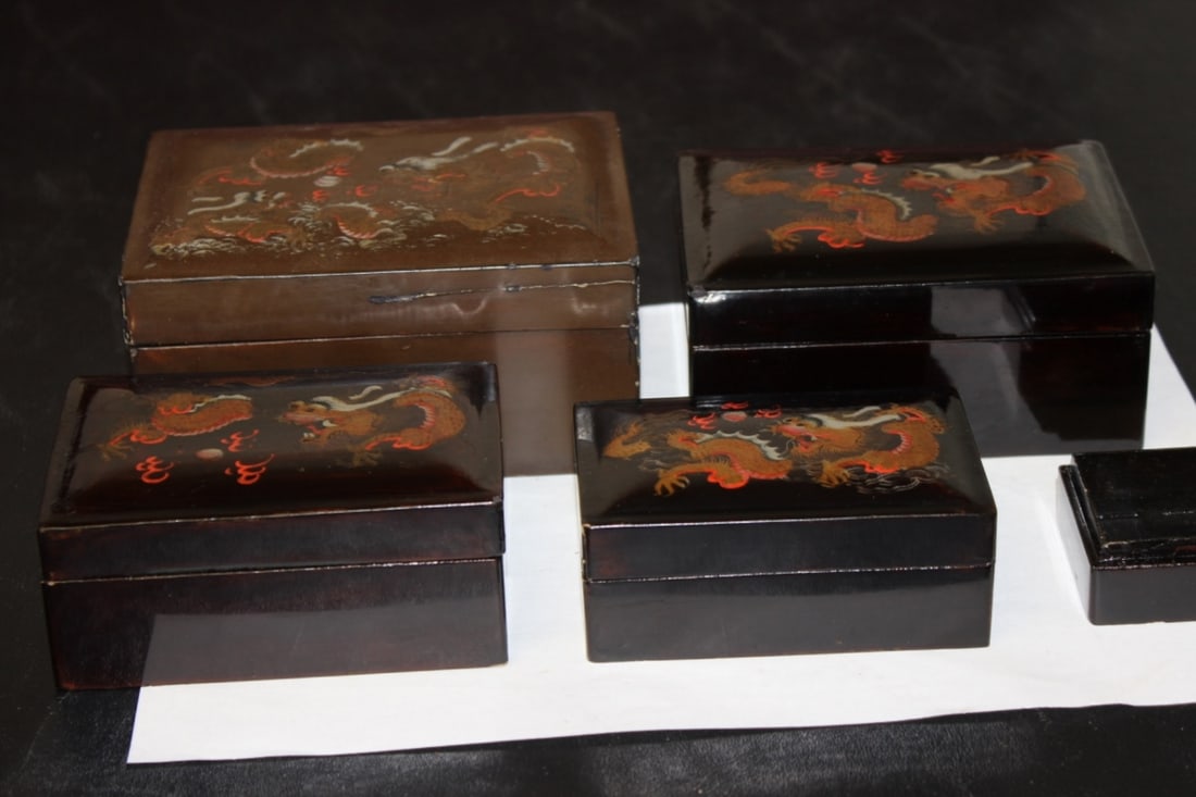 A Chinese Stacking Lacquer Box: please note: smallest box without lid - 5 boxes in total - 5 1/4" x 4" x 2 1/2"