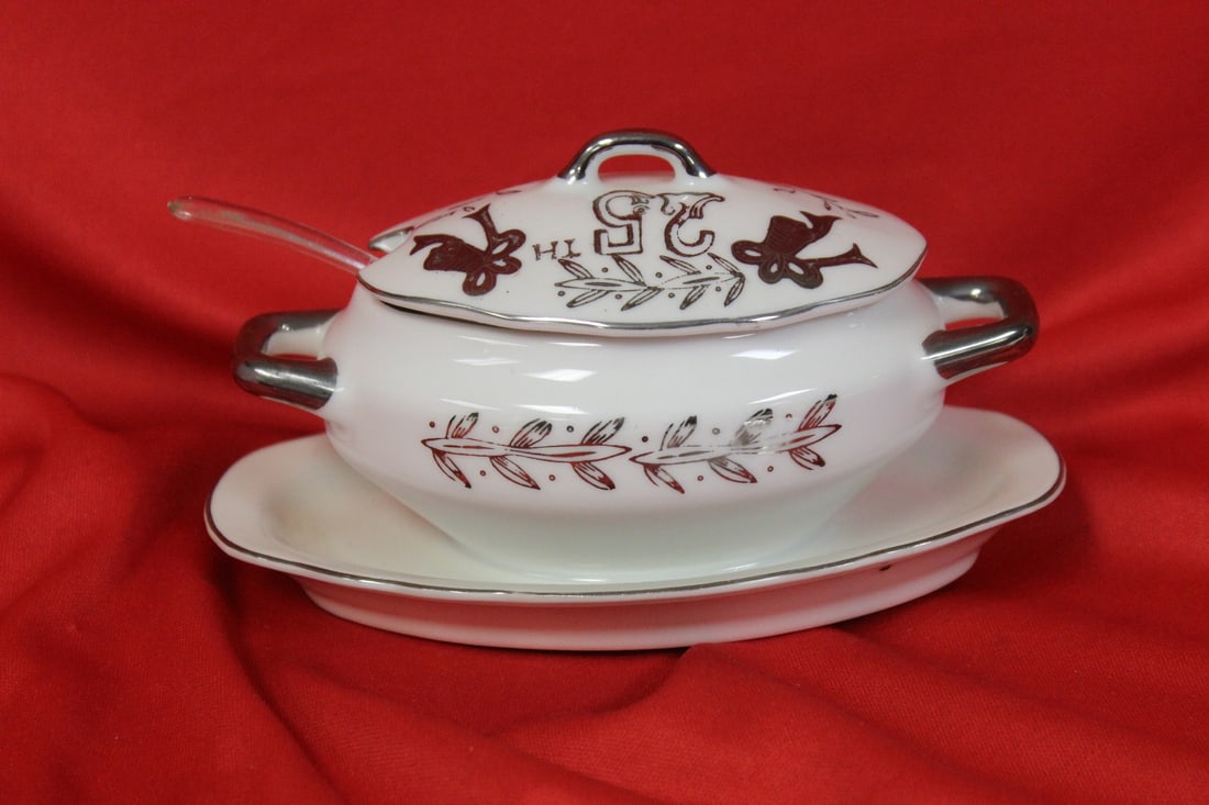 A Small Gravy Bowl: 5 3/4" long