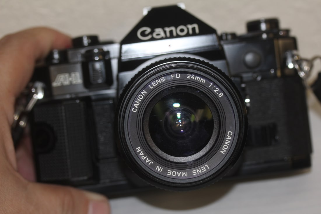 Cannon AE1 Camera with Lens: please note: not tested to see if works or not